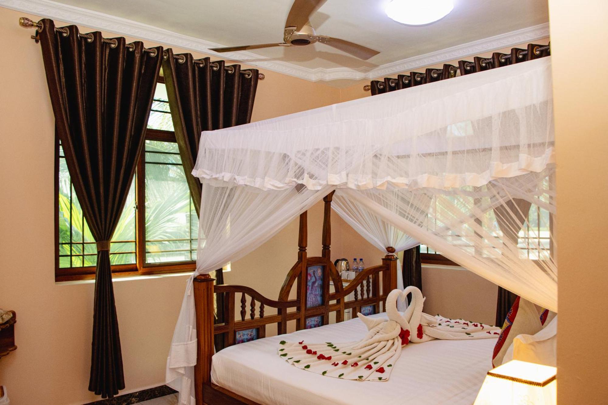 Sunny Palms Hotell Uroa